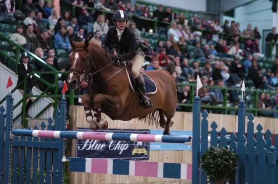 Jumping in front of a full grandstand at the Blue Chip Championships
