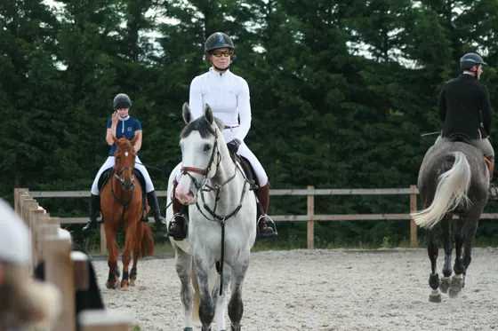 Nikki Ward jumping at a summer show
